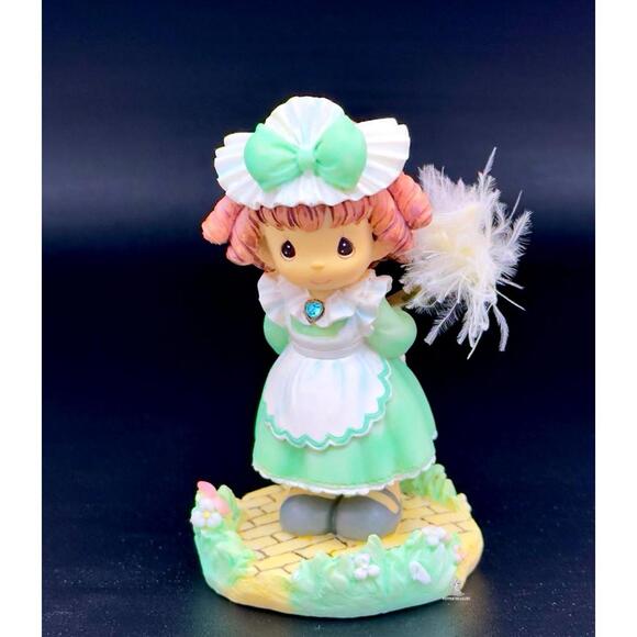 Precious Moments Wizard of Oz Figurine – Munchkin Maid with Feather Duster